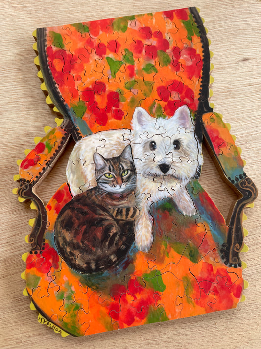 Cat and Dog on a sofa chair