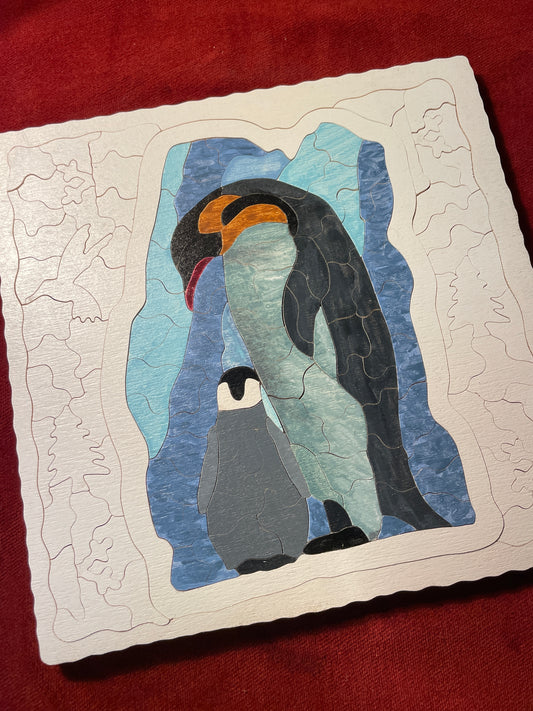 Penguins in frozen land